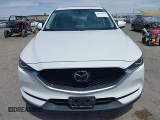 2018 Mazda CX-5 Touring with VIN JM3KFACM3J0381122, listed as a IAAI auction lot 42023838 with 76,121 mi miles. Bid and sale history available at carsss.com. Image 12.