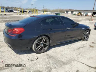2014 BMW 6 Series 650i xDrive z VIN WBA6B4C5XED099250, wystawiony jako Copart lot #52734845 z przebiegiem Nie podano mil oraz Czysty tytuł • Clean title. Historia ofert i sprzedaży dostępna na DreamBid. Obrazek 3.