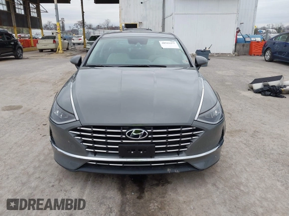 2022 Hyundai Sonata Hybrid Blue with VIN KMHL24JJ2NA048439, listed as a IAAI auction lot 40942477 with 64,855 mi miles. Bid and sale history available at carsss.com. Image 13.