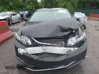 2014 Honda Civic LX z VIN 2HGFB2F5XEH538843, wystawiony jako IAAI lot #42232234 z przebiegiem 165 938 mil mil oraz . Historia ofert i sprzedaży dostępna na DreamBid. Obrazek 12.
