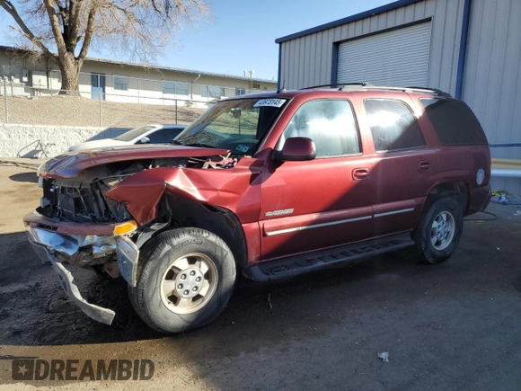 2002 Chevrolet Tahoe Z71 with VIN 1GNEK13Z62R310238, listed as a Copart auction lot 43973145 with 218,657 mi miles and Salvage Title. Bid and sale history available at carsss.com. Image 1.