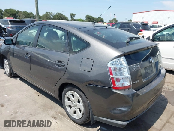 2007 Toyota Prius z VIN JTDKB20U173242693, wystawiony jako IAAI lot #42310546 z przebiegiem 250 887 mil mil oraz . Historia ofert i sprzedaży dostępna na DreamBid. Obrazek 3.