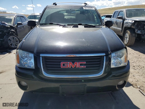2005 GMC Envoy SLE with VIN 1GKDT13S752390266, listed as a Copart auction lot 50766935 with 115,225 mi miles and Salvage Title. Bid and sale history available at carsss.com. Image 5.