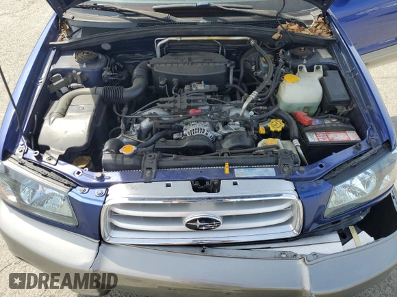2003 Subaru Forester XS z VIN JF1SG65633H749522, wystawiony jako Copart lot #53393445 z przebiegiem 138 592 mil mil oraz Szkoda całkowita • Salvage title. Historia ofert i sprzedaży dostępna na DreamBid. Obrazek 11.