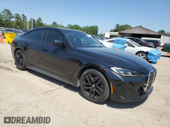 2023 BMW 4 Series 430i xDrive with VIN WBA73AV01PFN88144, listed as a Copart auction lot 53514735 with 61,582 mi miles and Salvage title. Bid and sale history available at DreamBid. Image 4.