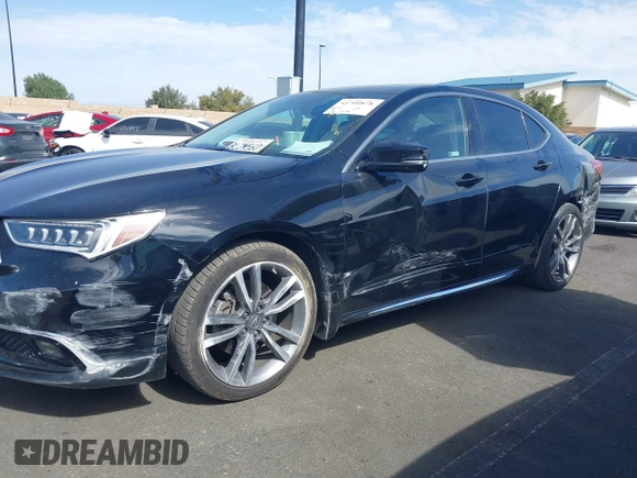 2019 Acura TLX w/Advance Pkg with VIN 19UUB3F85KA005610, listed as a IAAI auction lot 41700878 with 66,254 mi miles. Bid and sale history available at carsss.com. Image 6.