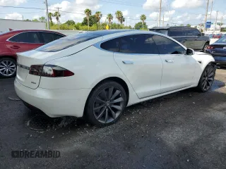 2017 Tesla Model S 100D z VIN 5YJSA1E21HF229936, wystawiony jako Copart lot #54734955 z przebiegiem 125 511 mil mil oraz Szkoda całkowita • Salvage title. Historia ofert i sprzedaży dostępna na DreamBid. Obrazek 3.