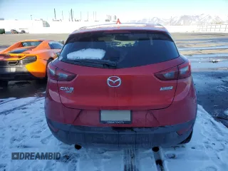 2016 Mazda CX-3 Grand Touring with VIN JM1DKBD78G0113185, listed as a Copart auction lot 42802145 with 158,068 mi miles and Salvage Title. Bid and sale history available at DreamBid. Image 6.