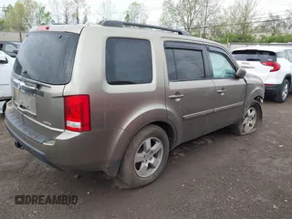 2011 Honda Pilot EX-L with VIN 5FNYF4H51BB076050, listed as a IAAI auction lot 42122883 with 143,288 mi miles and . Bid and sale history available at carsss.com. Image 4.