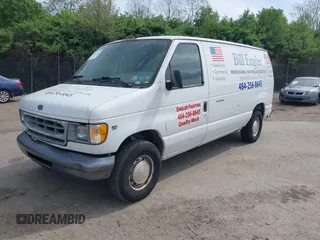 2000 Ford Econoline Cargo with VIN 1FTRE14W1YHB19251, listed as a IAAI auction lot 42114841 with 164,139 mi miles. Bid and sale history available at carsss.com. Image 2.