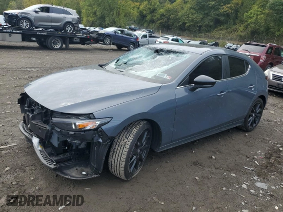 2023 Mazda 3 S Carbon Edition with VIN JM1BPBLM3P1618402, listed as a Copart auction lot 73179284 with 7,318 mi miles and Salvage title. Bid and sale history available at DreamBid. Image 1.