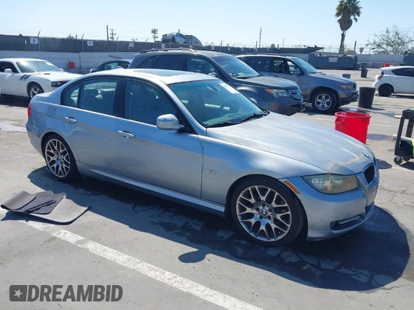2009 BMW 3 Series 328i with VIN WBAPH77509NM27323, listed as a IAAI auction lot 41991774 with 96,217 mi miles. Bid and sale history available at carsss.com. Image 1.