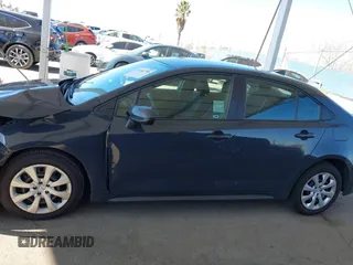2023 Toyota Corolla LE z VIN 5YFB4MDE6PP039721, wystawiony jako IAAI lot #41662799 z przebiegiem 31 992 mil mil oraz . Historia ofert i sprzedaży dostępna na DreamBid. Obrazek 14.