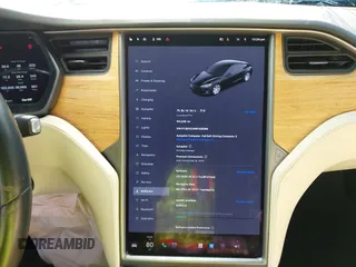 2021 Tesla Model S Long Range Plus z VIN 5YJSA1E24MF426299, wystawiony jako IAAI lot #41673498 z przebiegiem 102 035 mil mil oraz . Historia ofert i sprzedaży dostępna na DreamBid. Obrazek 18.
