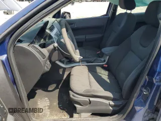 2009 Ford Focus SE with VIN 1FAHP35N69W173977, listed as a Copart auction lot 69018554 with 138,496 mi miles and Salvage Title. Bid and sale history available at carsss.com. Image 7.