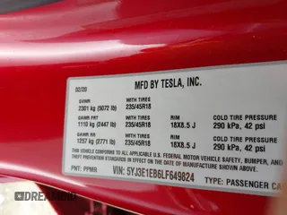 2020 Tesla Model 3 Long Range with VIN 5YJ3E1EB6LF649824, listed as a IAAI auction lot 41766020 with 71,230 mi miles. Bid and sale history available at carsss.com. Image 9.