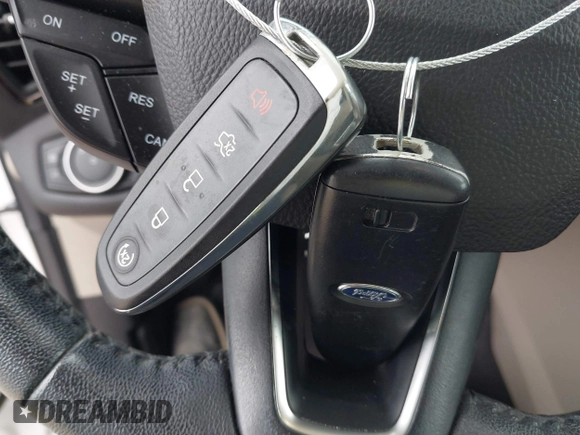 2018 Ford Escape Titanium with VIN 1FMCU9J98JUB87867, listed as a IAAI auction lot 42300123 with 48,357 mi miles and . Bid and sale history available at DreamBid. Image 11.
