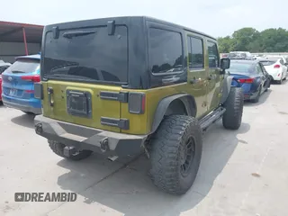 2008 Jeep Wrangler Unlimited Sahara with VIN 1J8GA59108L574959, listed as a IAAI auction lot 42171011 with Not Provided miles and . Bid and sale history available at carsss.com. Image 4.