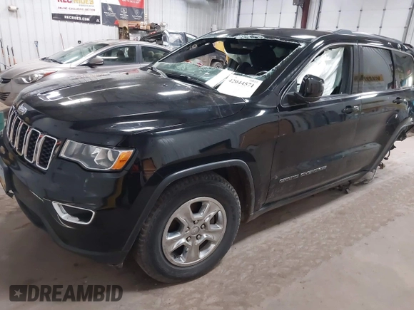 2017 Jeep Grand Cherokee Laredo with VIN 1C4RJFAG2HC625111, listed as a IAAI auction lot 42044571 with 148,533 mi miles and . Bid and sale history available at DreamBid. Image 21.