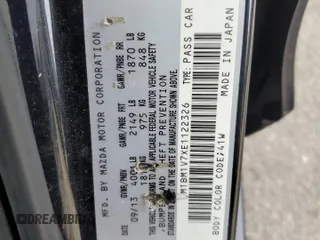 2014 Mazda 3 i Touring z VIN JM1BM1V7XE1122326, wystawiony jako Copart lot #86185154 z przebiegiem 100 067 mil mil oraz Szkoda całkowita • Salvage title. Historia ofert i sprzedaży dostępna na DreamBid. Obrazek 12.