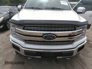 2020 Ford F-150 XL with VIN 1FTEW1E56LKE14567, listed as a IAAI auction lot 42080364 with 77,373 mi miles and . Bid and sale history available at DreamBid. Image 6.