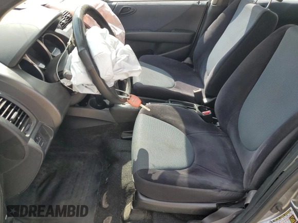 2007 Honda Fit Sport z VIN JHMGD38657S035465, wystawiony jako Copart lot #57635245 z przebiegiem 184 627 mil mil oraz Szkoda całkowita • Salvage title. Historia ofert i sprzedaży dostępna na DreamBid. Obrazek 7.