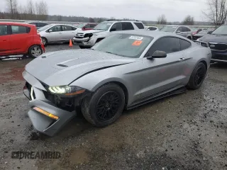2021 Ford Mustang EcoBoost with VIN 1FA6P8TH3M5138829, listed as a Copart auction lot 87252464 with 59,644 mi miles and Salvage Title. Bid and sale history available at carsss.com. Image 1.