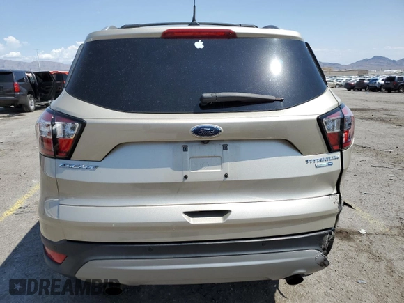 2018 Ford Escape Titanium with VIN 1FMCU9J91JUB44813, listed as a Copart auction lot 59920265 with 63,008 mi miles and Salvage title. Bid and sale history available at DreamBid. Image 6.