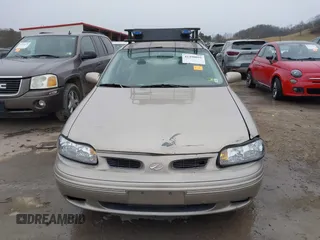 1999 Oldsmobile Cutlass GL z VIN 1G3NB52J8X6318863, wystawiony jako IAAI lot #41490091 z przebiegiem 106 821 mil mil oraz . Historia ofert i sprzedaży dostępna na DreamBid. Obrazek 12.