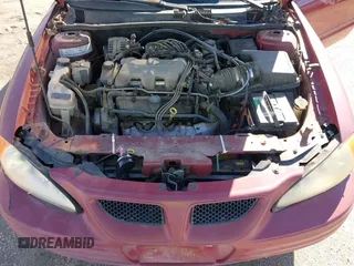 2005 Pontiac Grand Am SE with VIN 1G2NE52E45M202888, listed as a IAAI auction lot 41437235 with 65,968 mi miles. Bid and sale history available at carsss.com. Image 10.