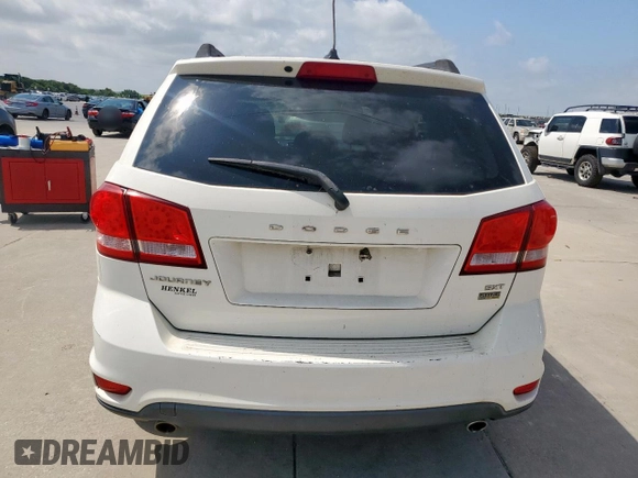 2012 Dodge Journey SXT z VIN 3C4PDCBG9CT213423, wystawiony jako Copart lot #65246735 z przebiegiem 319 806 mil mil oraz Szkoda całkowita • Salvage title. Historia ofert i sprzedaży dostępna na DreamBid. Obrazek 6.