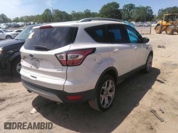 2017 Ford Escape Titanium with VIN 1FMCU0JD8HUE52149, listed as a IAAI auction lot 41974274 with 143,707 mi miles and . Bid and sale history available at DreamBid. Image 4.