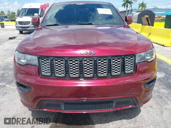 2017 Jeep Grand Cherokee Laredo with VIN 1C4RJFAG3HC701869, listed as a IAAI auction lot 42720101 with 67,311 mi miles and . Bid and sale history available at DreamBid. Image 6.