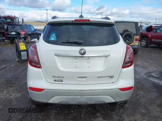 2017 Buick Encore Essence with VIN KL4CJGSB4HB081550, listed as a IAAI auction lot 41230961 with 112,991 mi miles and . Bid and sale history available at DreamBid. Image 16.