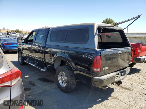 2003 Ford Super Duty F-250 XL with VIN 1FTNW21L93EB52407, listed as a Copart auction lot 70003244 with 460,149 mi miles and Salvage Title. Bid and sale history available at carsss.com. Image 2.