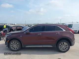 2023 Cadillac XT4 FWD Premium Luxury with VIN 1GYFZCR47PF106017, listed as a IAAI auction lot 42283401 with 40,734 mi miles and . Bid and sale history available at DreamBid. Image 14.