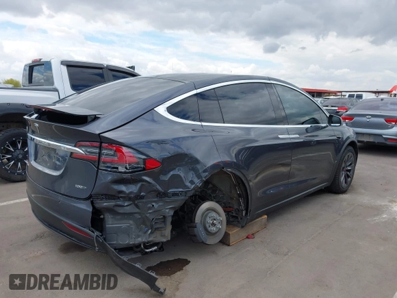 2018 Tesla Model X 75D with VIN 5YJXCBE29JF126629, listed as a IAAI auction lot 42205838 with 47,343 mi miles and . Bid and sale history available at DreamBid. Image 4.