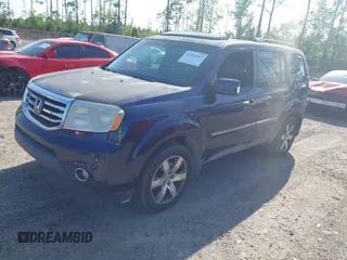 2014 Honda Pilot Touring with VIN 5FNYF4H92EB019248, listed as a IAAI auction lot 41942963 with 136,183 mi miles and . Bid and sale history available at carsss.com. Image 17.