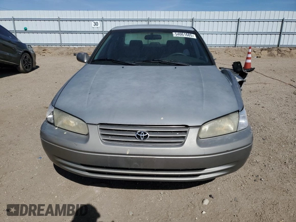 1999 Toyota Camry LE с VIN JT2BG22KXX0284593, выставлен на аукционе Copart как лот 54061685 с пробегом 229 047 миль миль и Списание • Salvage title. История ставок и продаж доступна на DreamBid. Изображение 5.
