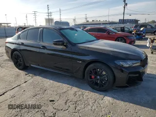 2023 BMW 5 Series 530e with VIN WBA13AG06PCM01727, listed as a Copart auction lot 83666424 with 40,831 mi miles and Salvage title. Bid and sale history available at DreamBid. Image 4.
