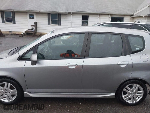 2007 Honda Fit Sport z VIN JHMGD38647S049521, wystawiony jako IAAI lot #42289057 z przebiegiem 130 434 mil mil oraz . Historia ofert i sprzedaży dostępna na DreamBid. Obrazek 14.