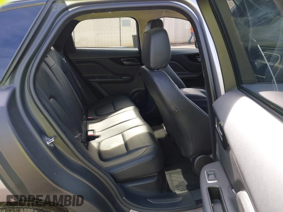 2020 Jaguar F-Pace 25t Premium with VIN SADCJ2FX7LA630157, listed as a IAAI auction lot 41410660 with 58,972 mi miles and . Bid and sale history available at DreamBid. Image 8.