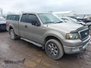 2004 Ford F-150 XLT with VIN 1FTPX14524NA34164, listed as a IAAI auction lot 41583236 with 168,780 mi miles. Bid and sale history available at carsss.com. Image 1.