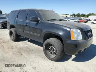 2013 GMC Yukon SLT with VIN 1GKS2CE03DR258564, listed as a Copart auction lot 61439774 with 147,284 mi miles and Salvage Title. Bid and sale history available at carsss.com. Image 4.