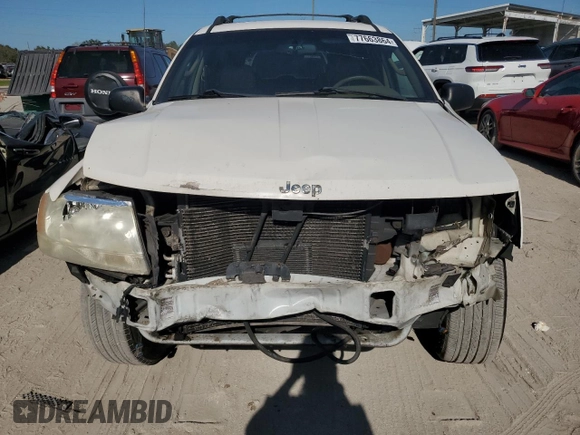 2002 Jeep Grand Cherokee Limited with VIN 1J4GX58S32C320843, listed as a Copart auction lot 77663864 with 289,537 mi miles and Salvage Title. Bid and sale history available at DreamBid. Image 5.