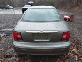 2003 Mercury Sable LS Premium with VIN 1MEFM55S13G612515, listed as a IAAI auction lot 41837589 with 62,173 mi miles and . Bid and sale history available at DreamBid. Image 16.