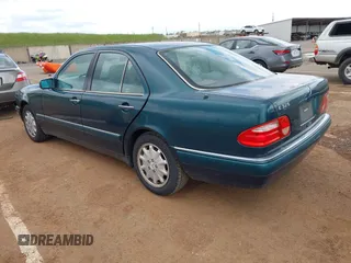 1996 Mercedes-Benz E-Class with VIN WDBJF55F7TJ022572, listed as a IAAI auction lot 41936649 with 187,706 mi miles. Bid and sale history available at carsss.com. Image 3.