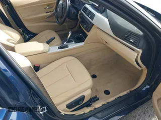 2013 BMW 3 Series 328i with VIN WBA3C1C58DK103904, listed as a IAAI auction lot 41590683 with 108,615 mi miles. Bid and sale history available at carsss.com. Image 5.