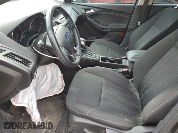 2015 Ford Focus SE z VIN 1FADP3F24FL357329, wystawiony jako Copart lot #59976215 z przebiegiem 182 407 mil mil oraz Czysty tytuł • Clean title. Historia ofert i sprzedaży dostępna na DreamBid. Obrazek 7.