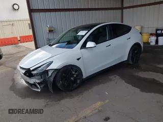 2023 Tesla Model Y Long Range with VIN 7SAYGAEE0PF787216, listed as a IAAI auction lot 41589954 with 17,985 mi miles and . Bid and sale history available at DreamBid. Image 20.